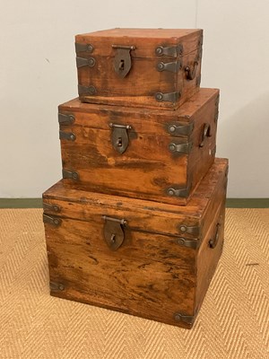 Lot 809 - A set of three graduated wooden boxes with...