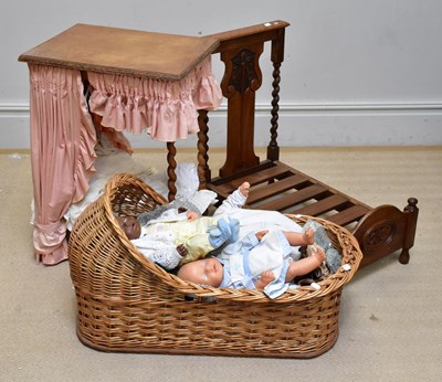 Lot 81 - Two oak doll's beds including a four poster...