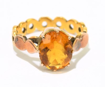 Lot 1192 - A 22ct yellow gold dress ring set with a...