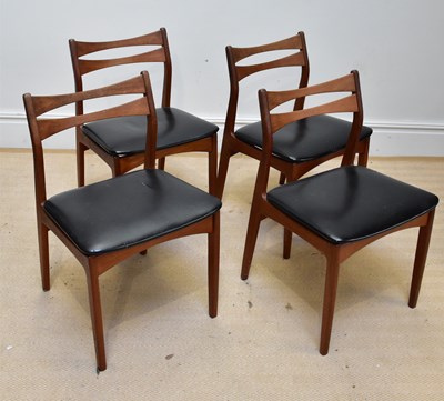 Lot 1025 - Four mid century teak dining chairs with black...