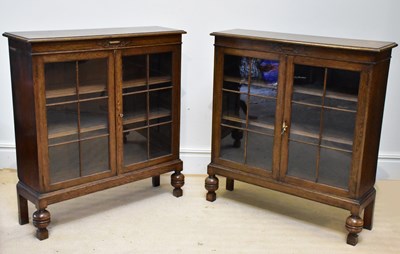 Lot 1048 - MAPLE & CO; a pair of early 20th century oak...