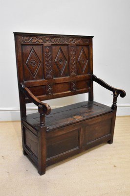 Lot 1168 - An 18th century and later oak settle with...