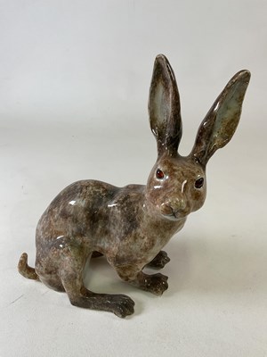 Lot 304 - WINSTANLEY; a large ceramic seated hare with...