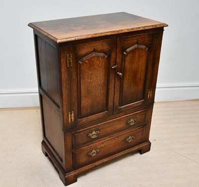 Lot 1072 - TITCHMARSH & GOODWIN; an oak TV cabinet with...