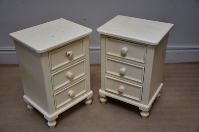 Lot 1126 - A pair white painted three drawer bedsides,...