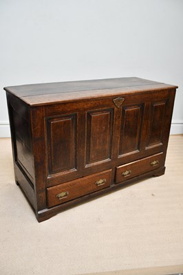 Lot 1205 - An 18th century four panel oak two drawer...