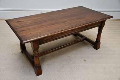 Lot 1127 - A reproduction oak rectangular coffee table,...