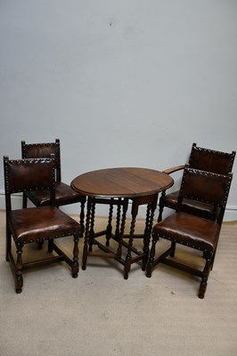 Lot 1128 - A set of four reproduction oak and leather...