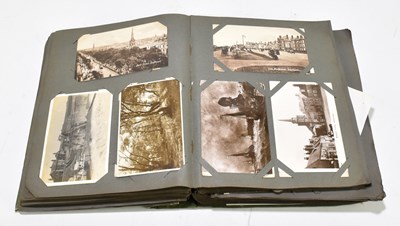 Lot 900 - An album of Edwardian and later postcards to...