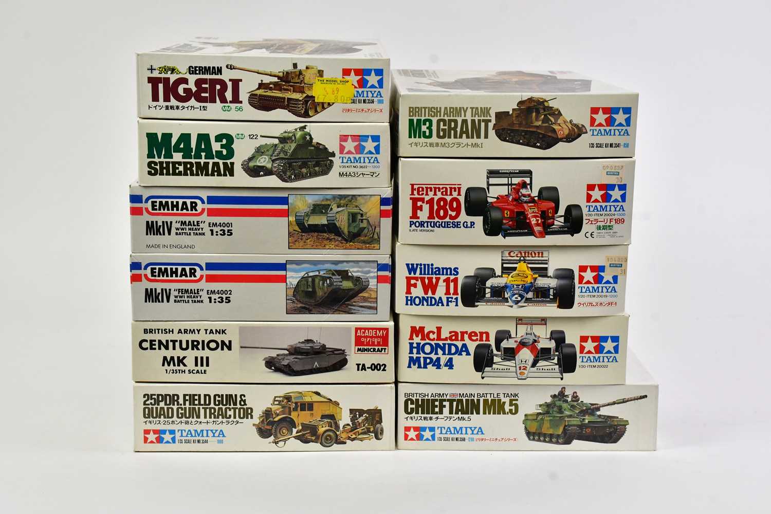 Lot 146 - TAMIYA; a collection of six model tank kits to...