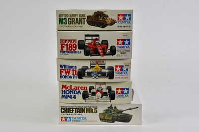 Lot 146 - TAMIYA; a collection of six model tank kits to...