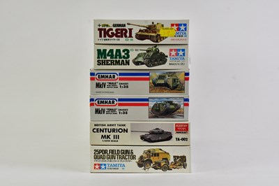 Lot 146 - TAMIYA; a collection of six model tank kits to...