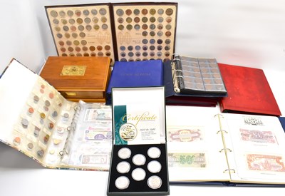 Lot 758 - Four coin albums, one containing pre-decimal...