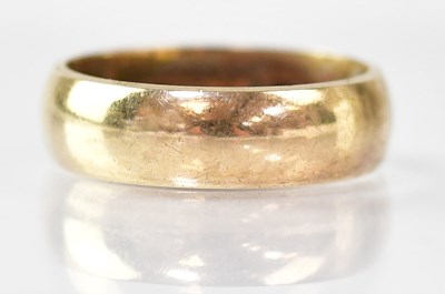 Lot 856 - A 9ct yellow gold wedding band, size M, approx....