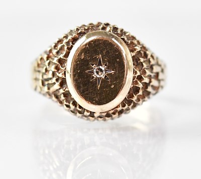 Lot 886 - A 9ct yellow gold signet ring, set with a tiny...