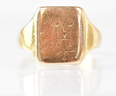 Lot 857 - A 9ct yellow gold signet ring, with monogram...