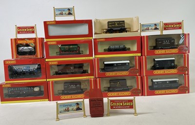 Lot 224 - HORNBY; Thirteen boxed wagons and carriers,...