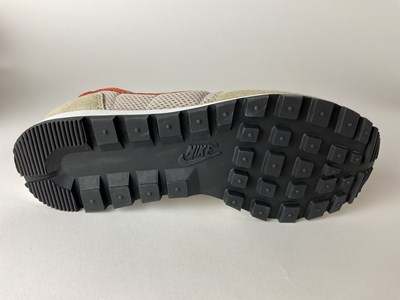 Lot 34 - NIKE; a pair of vintage Nike Metro Plus C...