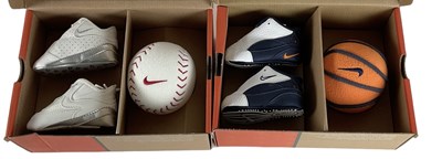 Lot 85 - NIKE; two first finger roll gift pack boxes...