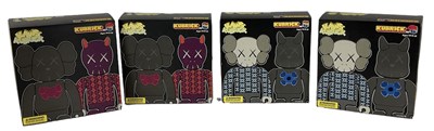 Lot 86 - KAWS; four boxed Kaws Kubrick sets.