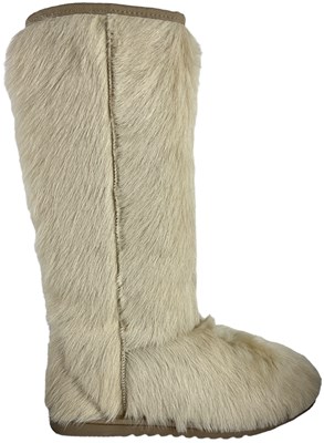 Lot 83 - MOU; a pair of Nanuq beige furr effect boots.