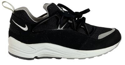 Lot 55 - NIKE; a pair of Huarache black trainers, size...