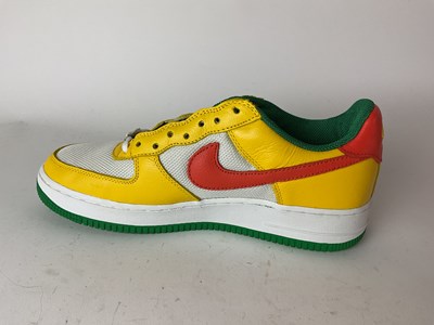 Lot 27 - NIKE; a pair of Air Force 1 Carnival Yellow...