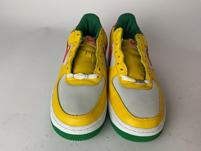 Lot 27 - NIKE; a pair of Air Force 1 Carnival Yellow...