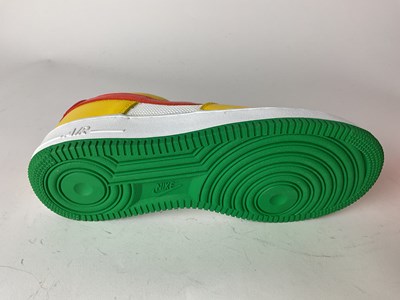 Lot 27 - NIKE; a pair of Air Force 1 Carnival Yellow...
