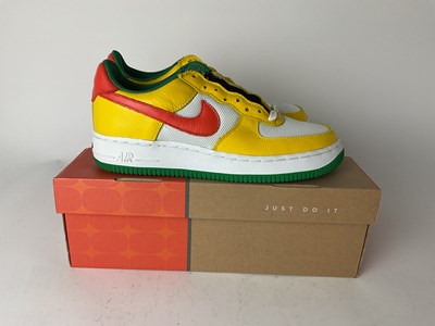 Lot 27 - NIKE; a pair of Air Force 1 Carnival Yellow...