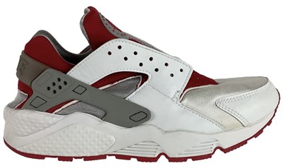 Lot 61 - NIKE; a pair of Huarache LE white, red and...