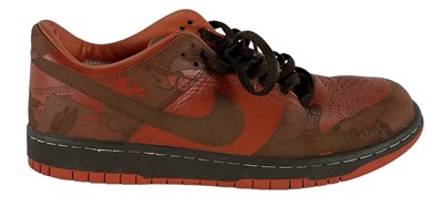 Lot 12 - NIKE; a pair of SB Dunk Low 1 Piece trainers,...