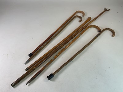 Lot 94 - Six various wooden walking sticks, two with...