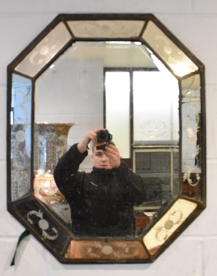 Lot 92 - An early 20th century octagonal wall mirror,...