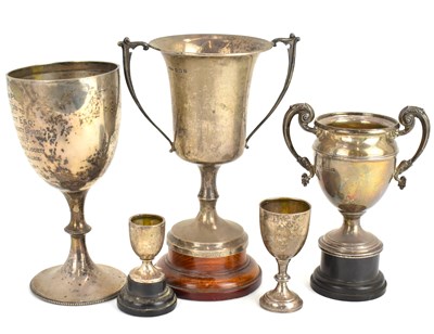 Lot 738 - Five hallmarked silver trophies, height of...