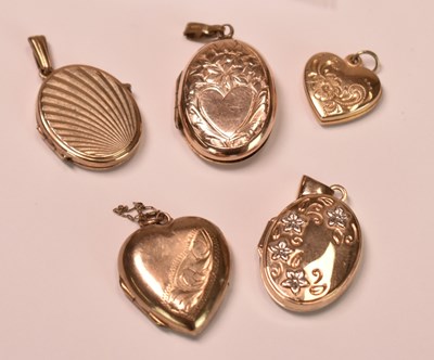 Lot 588 - Five 9ct gold lockets, two of heart shape, one...