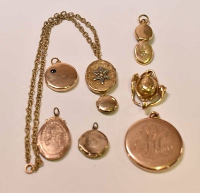 Lot 597 - A group of yellow metal lockets including one...