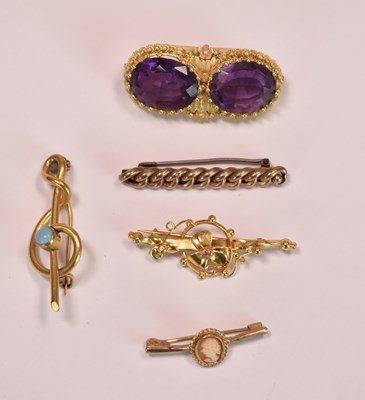 Lot 617 - Three 9ct yellow gold brooches (one with steel...