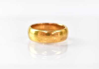 Lot 850 - A gold wedding band, size K, approx. 7.6g.