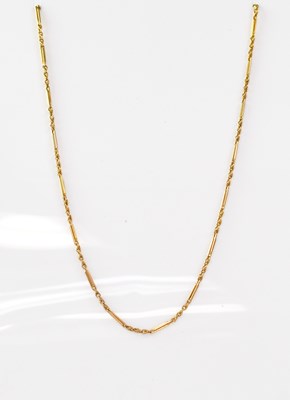 Lot 812 - A 9ct gold bar and twist link chain with hoop...