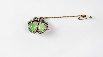 Lot 787 - An Edwardian brooch with two chrysoprase...