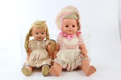 Lot 100 - Two vintage dolls including a celluloid...