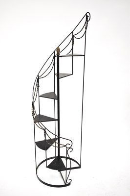 Lot 93 - A wrought iron faux spiral staircase planter,...