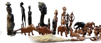 Lot 543 - A large quantity of African carved wooden...