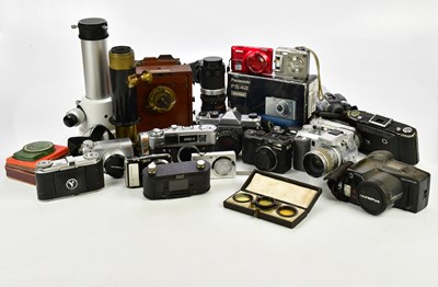 Lot 522 - A collection of cameras and lens, to include a...