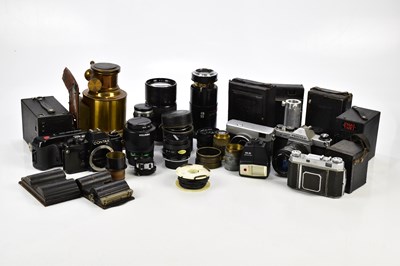 Lot 523 - A collection of cameras and lenses, to include...