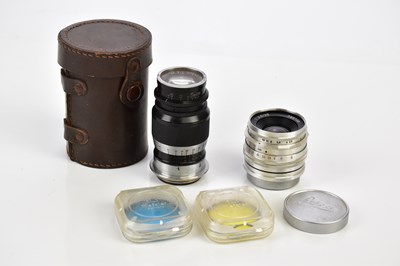 Lot 497 - Two screw mount lenses (Leica fit), comprising...