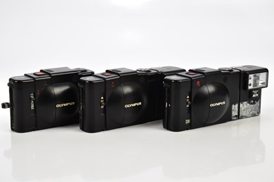 Lot 462 - OLYMPUS; three Olympus compact cameras,...