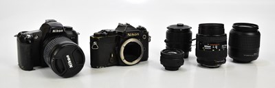 Lot 423 - NIKON: a Nikon FE 35mm film camera, serial No...