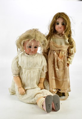 Lot 71 - SIMON & HALBIG; a German bisque headed doll...